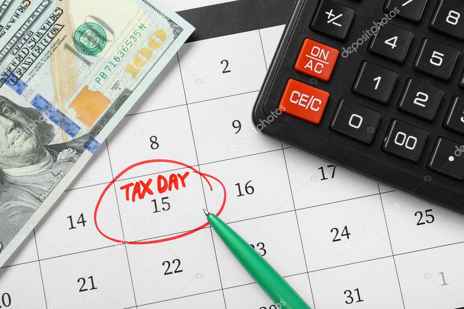 Calendar with tax day marked, calculator, and cash for financial planning.